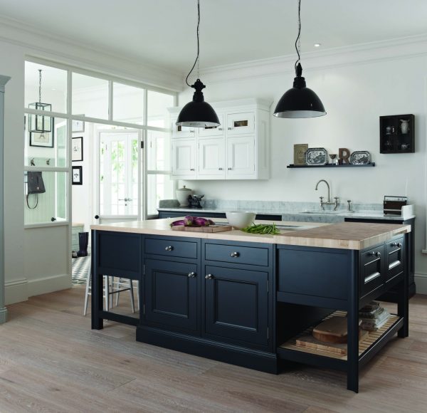 navy blue kitchen island with wooden worktop